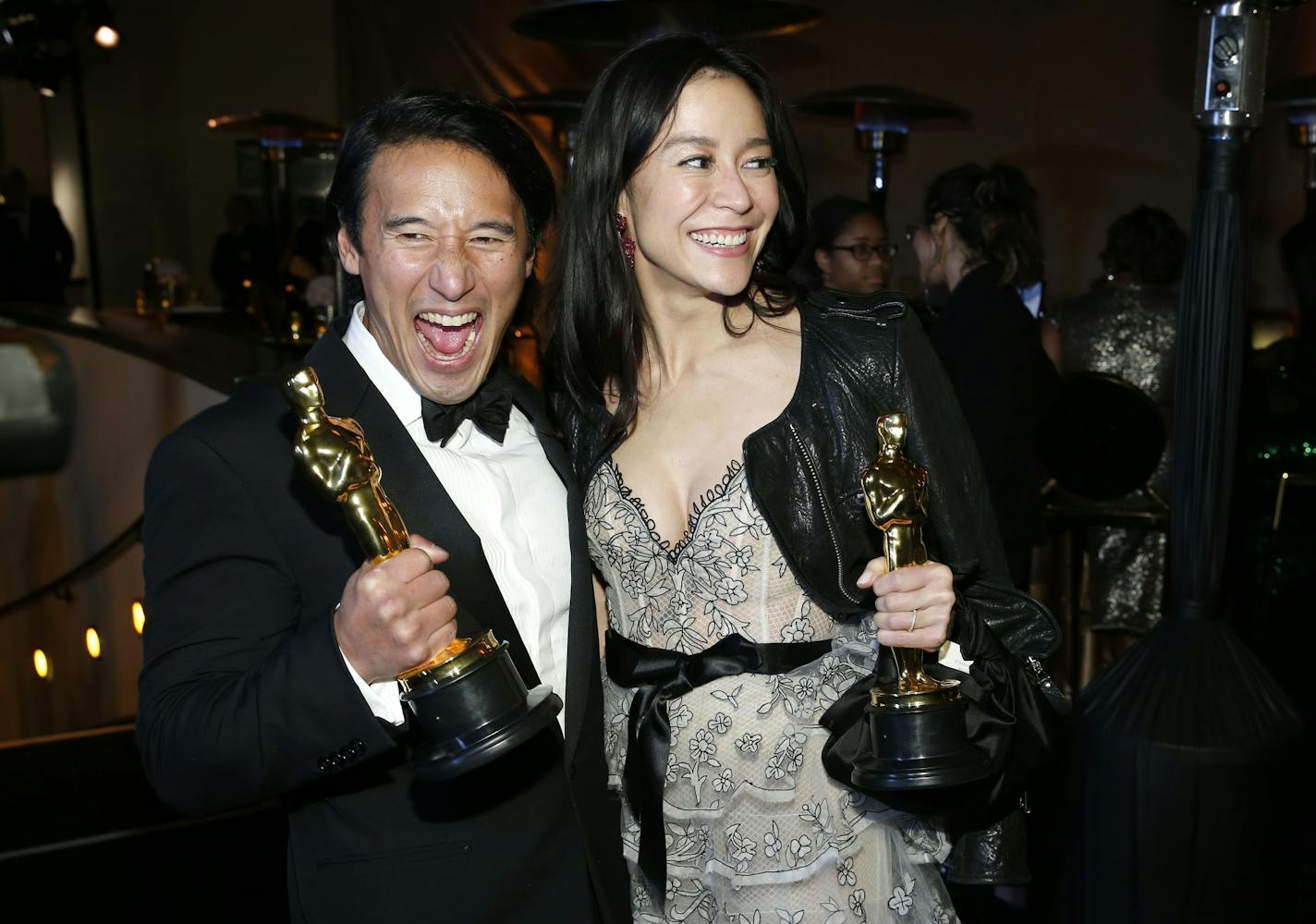 Jimmy Chin, left, and Elizabeth Chai Vasarhelyi, winners of the award for best documentary feature for "Free Solo", attend the Governors Ball after the Oscars on Sunday, Feb. 24, 2019, at the Dolby Theatre in Los Angeles. (Photo by Eric Jamison/Invision/AP)