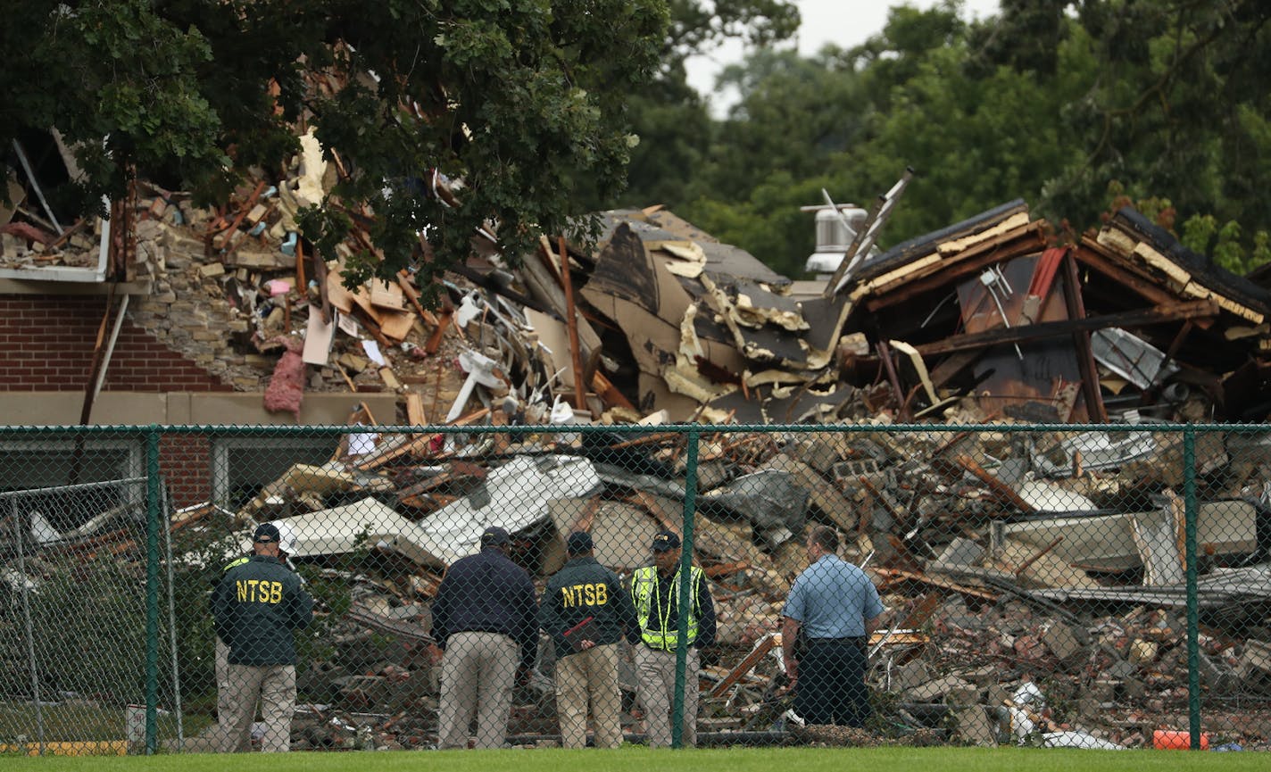 NTSB and Minneapolis police view the wreckage after Wednesday's explosion at Minnehaha Academy. Photos by ANTHONY SOUFFLE/STAR TRIBUNE