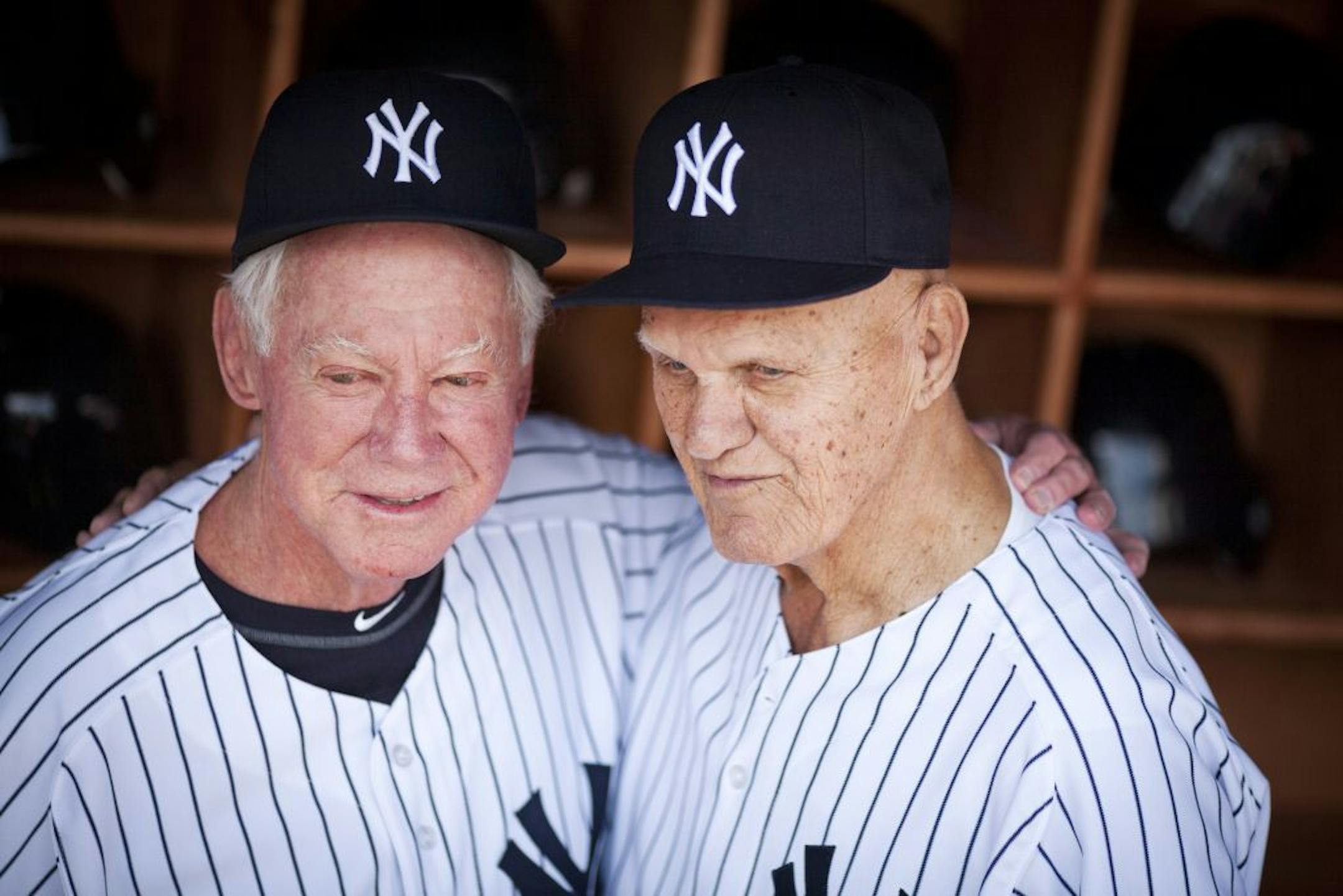 FILE -- Whitey Ford, left, with Bill Skowron during Old-Timers Day at Yankee Stadium in New York, June 26, 2011.