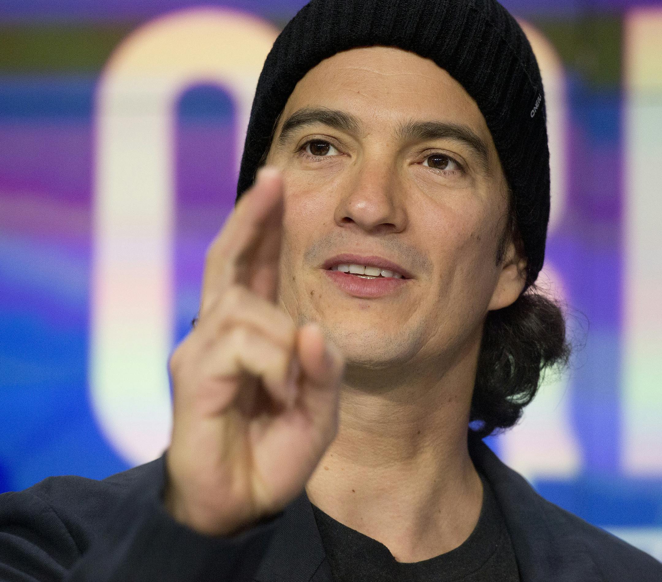 Adam Neumann, co-founder and CEO of WeWork, attends the opening bell ceremony at Nasdaq, Tuesday, Jan. 16, 2018, in New York. WeWork is a privately held shared workspace company based in New York. (AP Photo/Mark Lennihan) ORG XMIT: NYML103