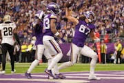 Minnesota Vikings tight end T.J. Hockenson (87) celebrates after scoring a touchdown late in the second quarter of an NFL game between the Minnesota V