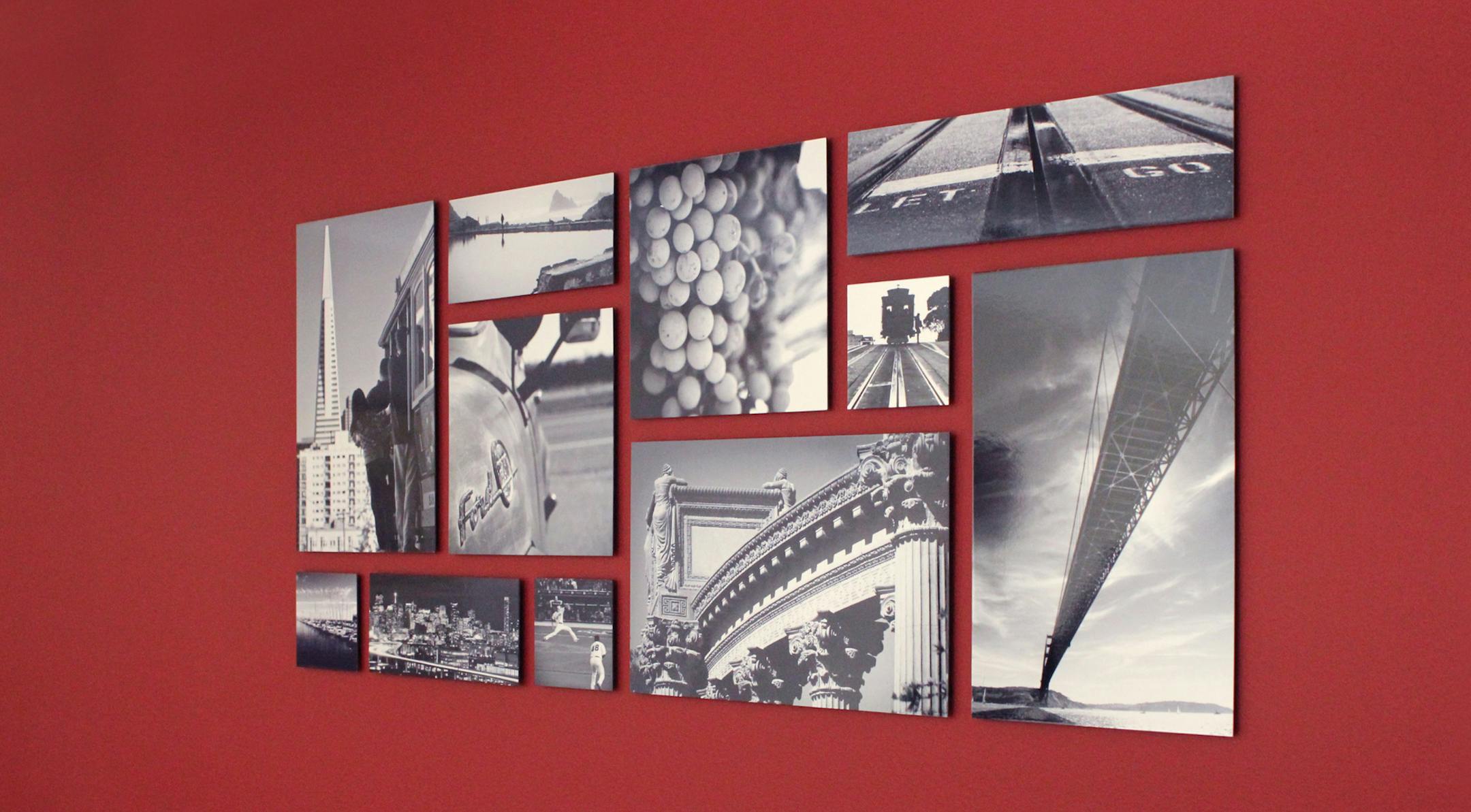 This undated publicity photo provided by CollegeWall Inc. shows a collagewall display designed and photographed by Jason Rodman in a bedroom in San Francisco. Previsualize your wall online, then order the paper grid template, push pegs and photos from Collagewall.com. Family, vacation and personal interest pictures are some of the themes you can use to create a photographic salon wall. (AP Photo/Collagewall Inc., Jason Rodman) ORG XMIT: NYLS339