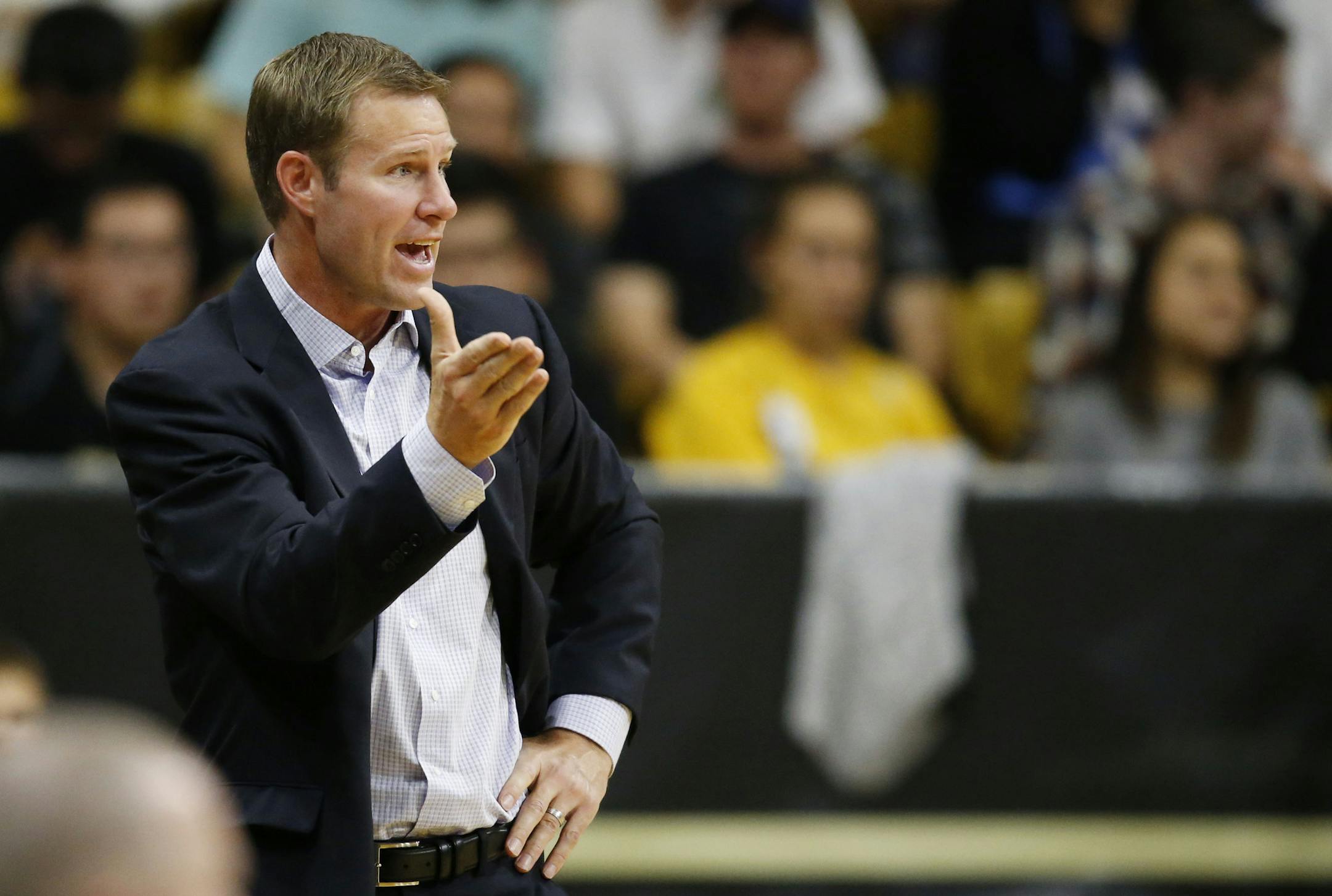 Chicago Bulls head coach Fred Hoiberg directs his team against the Denver Nuggets in the first half of an NBA preseason basketball game Thursday, Oct. 8, 2015, in Boulder, Colo. (AP Photo/David Zalubowski)