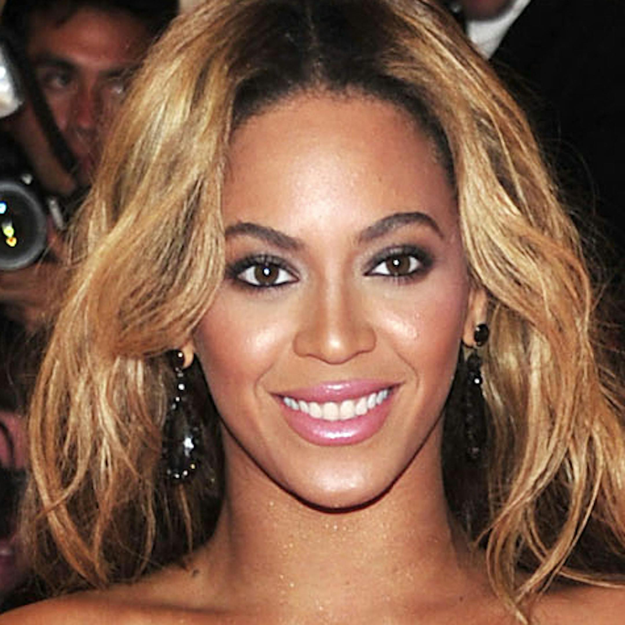 FILE - This May 6, 2013 file photo shows singer Beyonce at The Metropolitan Museum of Art's Costume Institute benefit in New York. Beyonce is canceling her Tuesday, May 14, concert in Belgium because of dehydration and exhaustion. In an email to The Associated Press, the singer's publicist says Beyonce has been advised by her doctors to rest. She was scheduled to perform at the Sportpaleis in Antwerp. The show will be rescheduled and tickets can be used at that show. (Photo by Charles Sykes/Invi