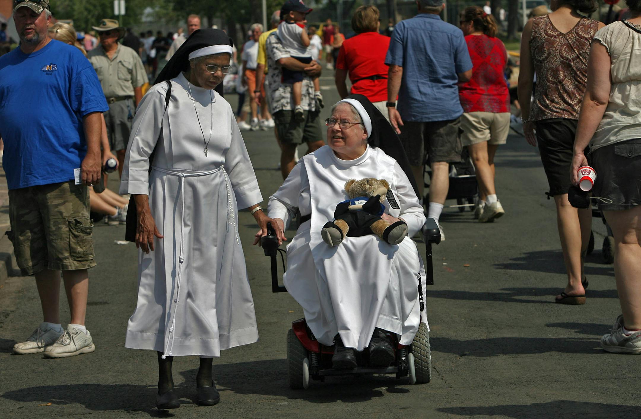 The State Fair offers a little something for everyone, including Sisters Albert Walsh, right, and Polsy Kalambukattu from Our Lady of Good Council Home in St. Paul. Walsh said she enjoys everything about the fair. The sisters, with Sister dePaul Muller (not pictured), were on their way to see the animals.
