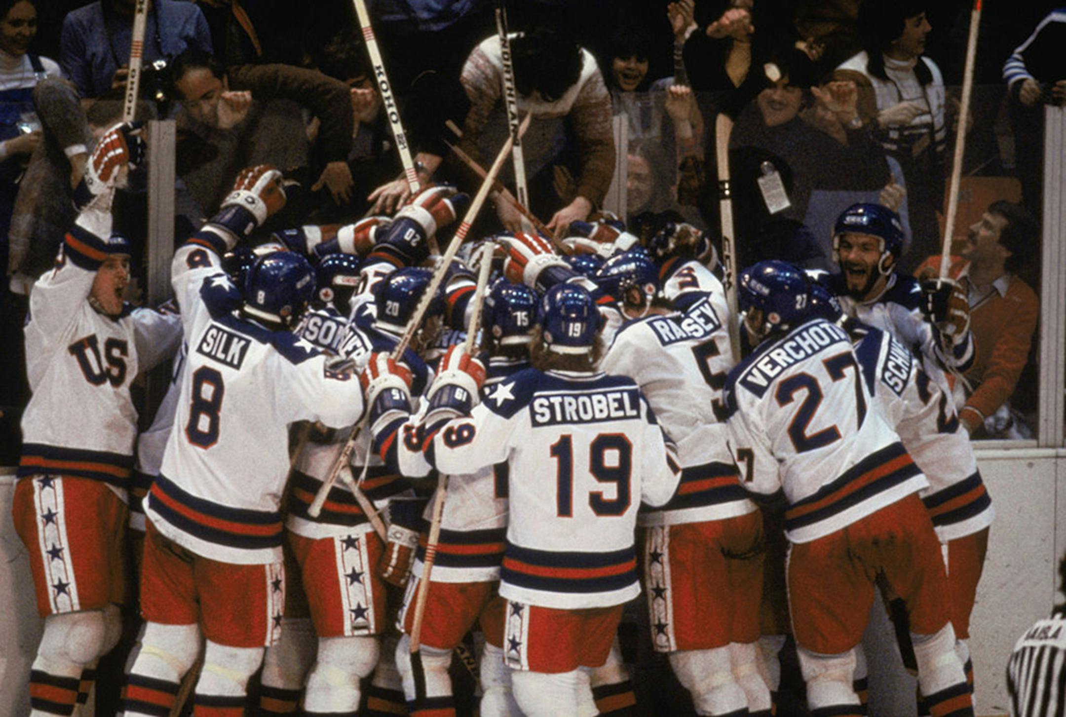 Team USA celebrates their 4-3 victory over the Soviet Union in the semi-final Men's Ice Hockey event at the Winter Olympic Games in Lake Placid, New York on February 22, 1980. The game was dubbed "the Miracle on Ice." The USA went on to win the gold medal by defeating Finland 4-2 in the gold medal game. (Steve Powell/Getty Images/TNS) ORG XMIT: 1584994