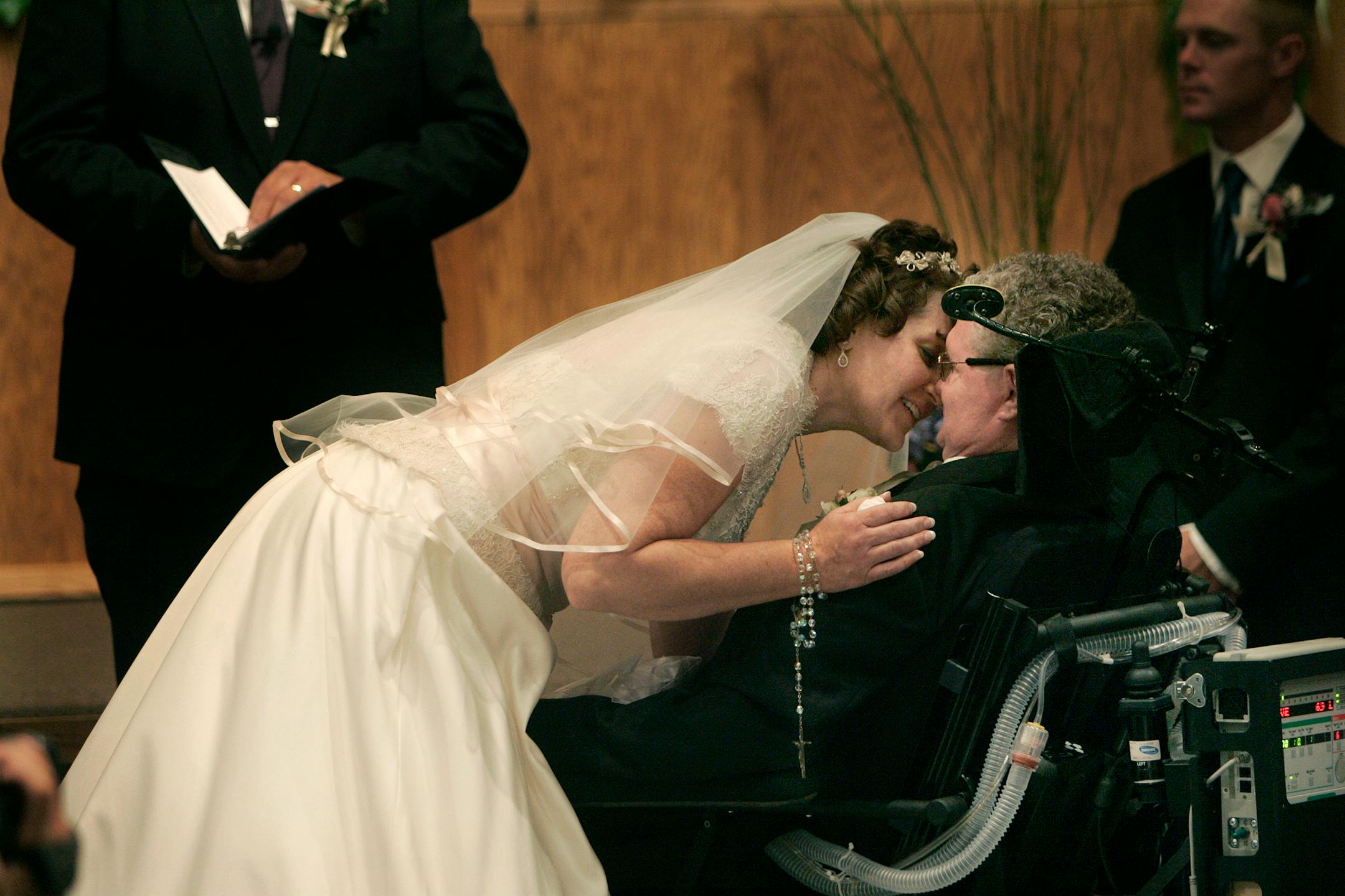 Joan Kennedy kissed her husband, Richard Steele, after they exchanged wedding vows Friday at River Valley Christian Church in Lake Elmo. "Everybody wanted to care for Dick," said Kennedy, who used to be Steele's caregiver. Steele was struck with ALS, Lou Gehrig's disease, nearly 20 years ago.