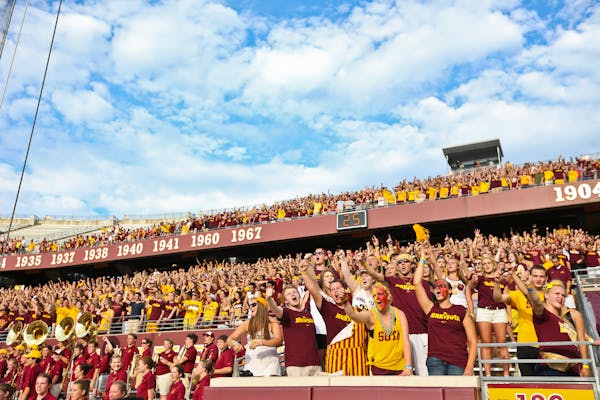 Gophers fans, and empty seats in the upper deck, during the game against UNLV in the season opener at TCF Bank Stadium.