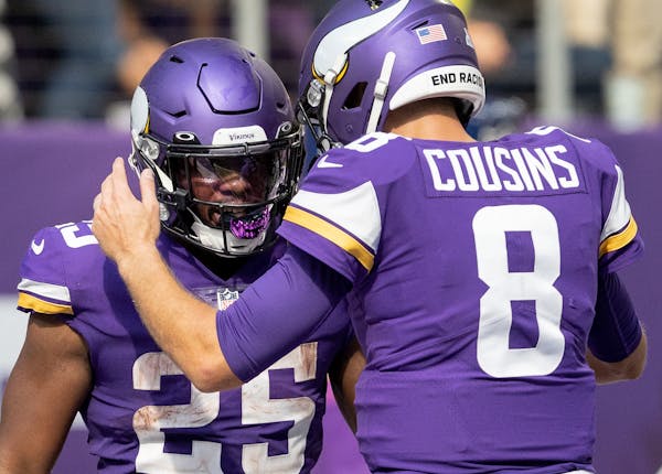 Running back Alexander Mattison and  quarterback Kirk Cousins during the Vikings’ 19-17 win over Detroit in Week 5. 