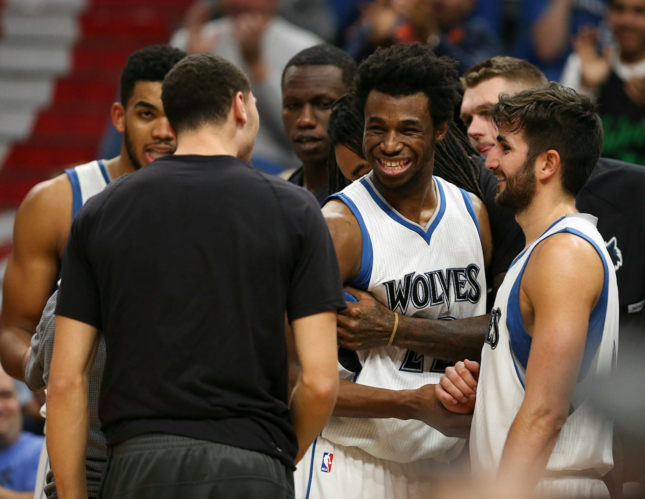 Timberwolves forward Andrew Wiggins (22) beamed as he came off the court and was congratulated by teammates late in the fourth quarter Sunday after putting up a career-best 47 points.