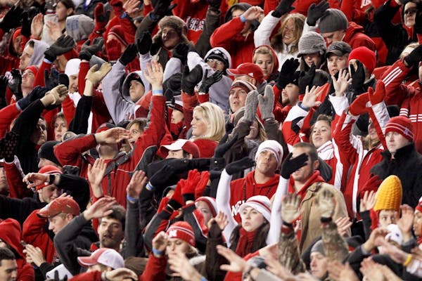 Nebraska fans wave their arms after a Nebraska touchdown in 2010.