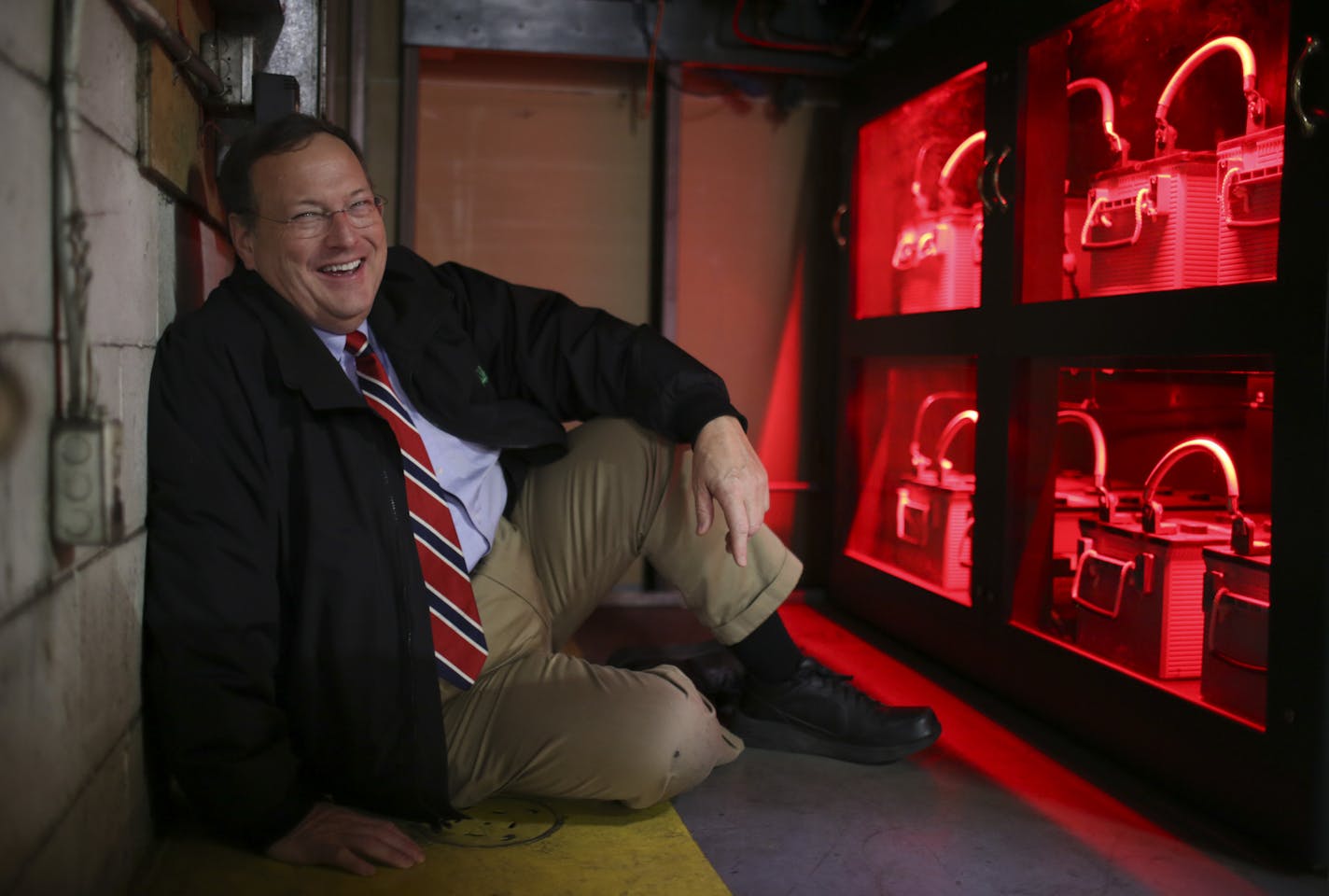 Richard Murphy with batteries that are the backup power supply for the computer system at a Murphy Warehouse Co. facility in Minneapolis Monday afternoon. The batteries are kept charged by a passive solar array on the roof of the warehouse. ] JEFF WHEELER &#x201a;&#xc4;&#xa2; jeff.wheeler@startribune.com Richard Murphy is an award winning landscape architect who has put the principals of his profession to work in his family owned warehousing and freight logistics business. Under Murphy's directi