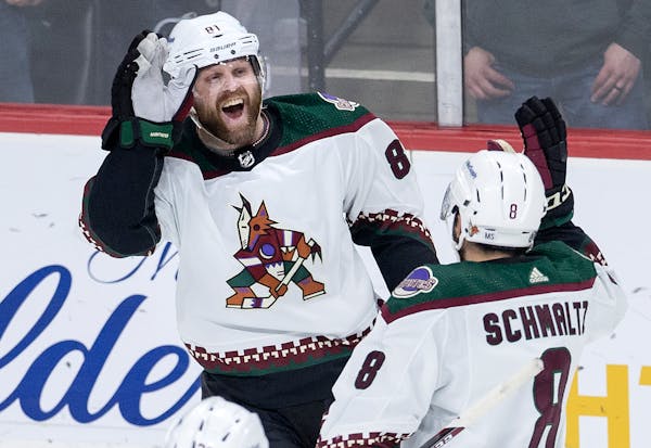 Phil Kessel (81) of the Arizona Coyotes celebrates after scoring an empty net goal in the third period Tuesday, April 26, at Xcel Energy Center in St.