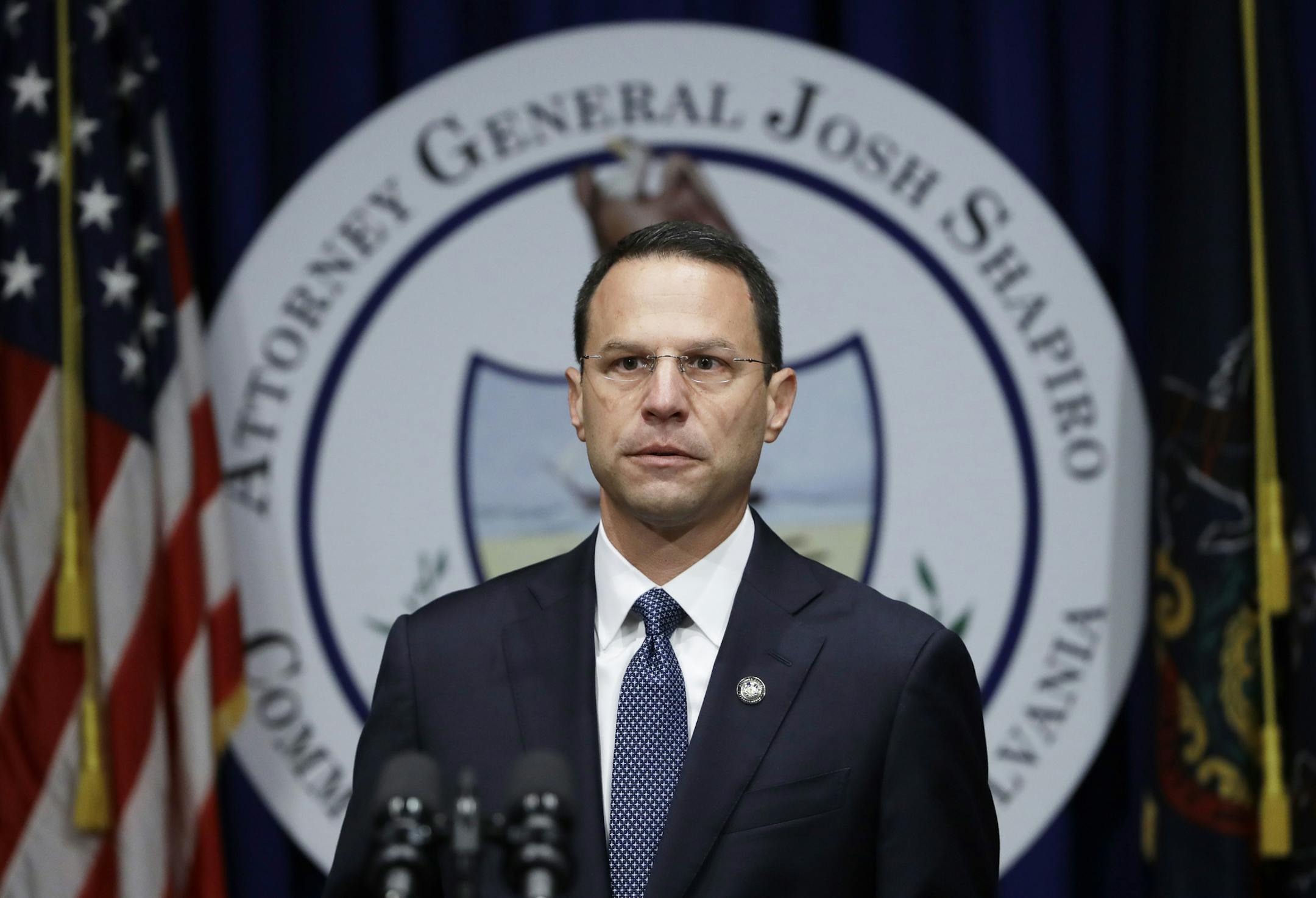 Pennsylvania Attorney General Josh Shapiro speaks during a news conference at the Pennsylvania Capitol in Harrisburg, Pa., Tuesday, Aug. 14, 2018. A Pennsylvania grand jury says its investigation of clergy sexual abuse identified more than 1,000 child victims. The grand jury report released Tuesday says that number comes from records in six Roman Catholic dioceses. (AP Photo/Matt Rourke)