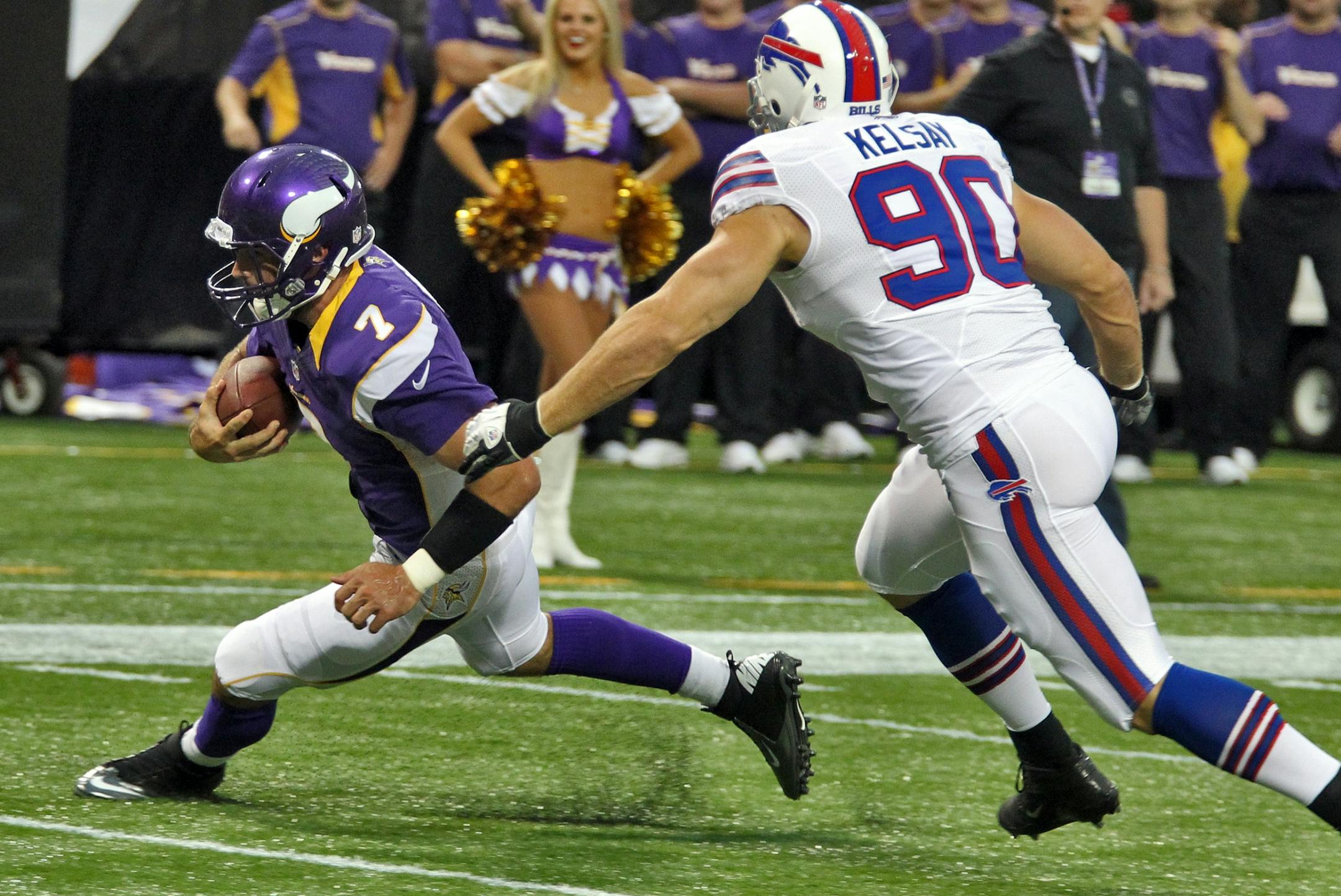 Christian Ponder eluded Bills tackler Chris Kelsay (90) mlevison@startribune.com