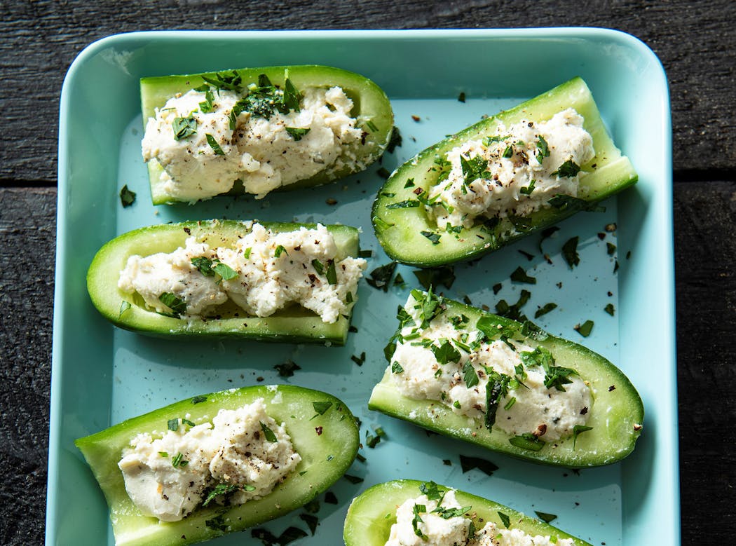 Cucumbers stuffed with herbed cheese makes a refreshing side but can be made into a main meal, too.