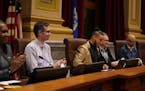 Minneapolis council members from left, Andrea Jenkins, Andrew Johnson, Phillipe Cunningham, Cam Gordon and Jeremy Schroeder at a public hearing on Nov