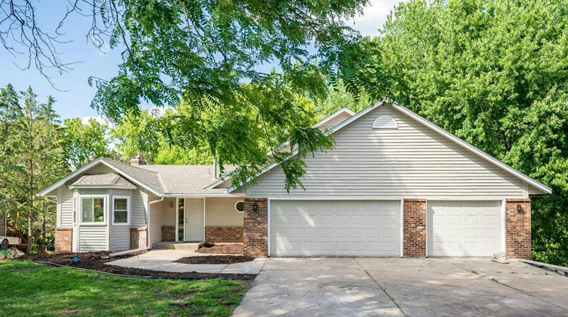 Maple Grove Built in 1985, this four-bedroom, three-bath house has 3,100 square feet and features a skyllight, vaulted ceilings, fireplace, eat-in kitchen with quartz countertops and stainless steel appliances,, four-season porch, walkout basement and a three-car attached garage, with a three-car garage/workship underneath. Listed by Joe Houghton, ReMax Results, 763-300-2702.