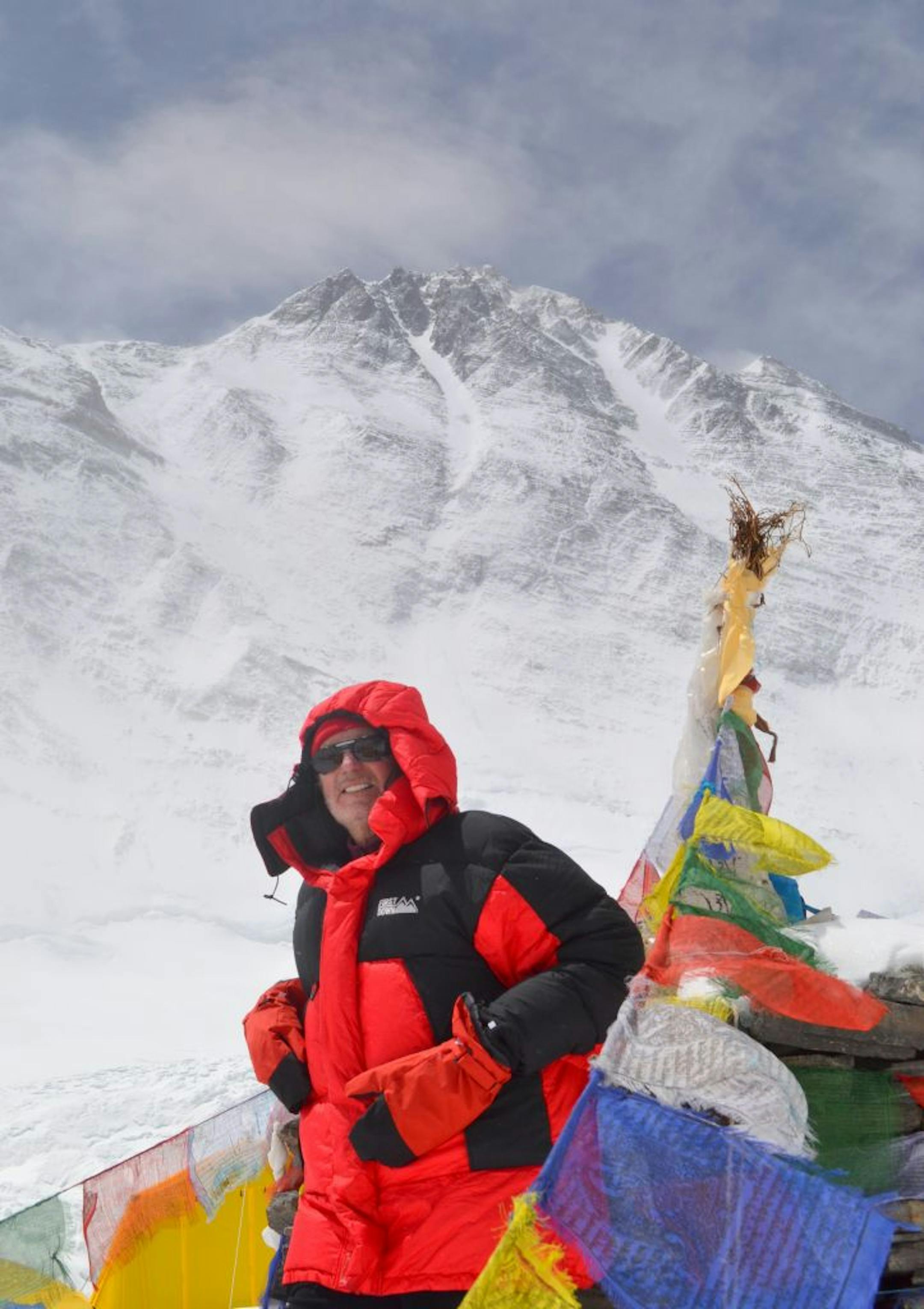 Fred Leverentz on Everest (the summit appears far in the distance, upper right, snow trailing off of it).
