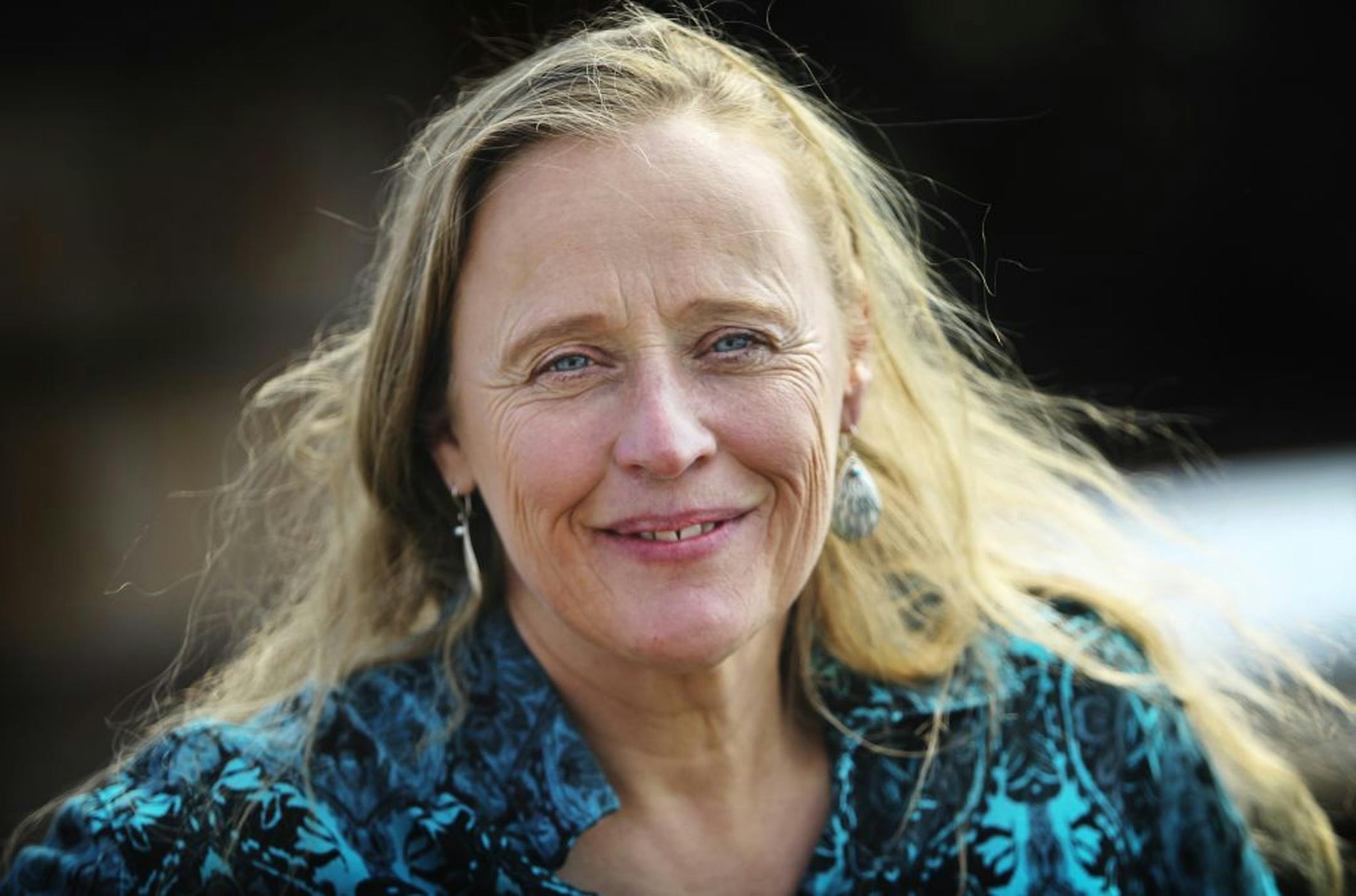 Author Atina Diffley seen in her greenhouse on their farm in Farmington, MN, Friday, April 6, 2012.