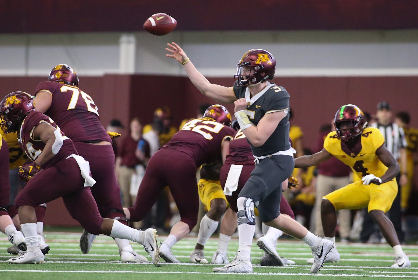 Maroon quarterback Zack Annexstad (5) passed for 191 yards and a touchdown against Gold in the spring football game.