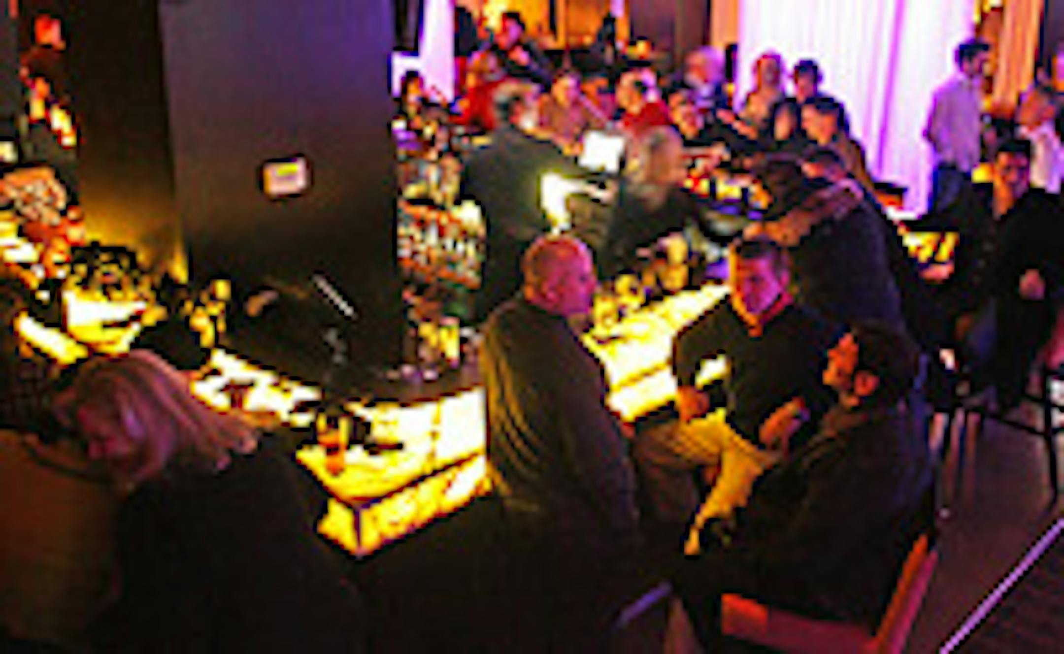 Late-night patrons at one of the several bars in Seven Sushi, overlooking Hennepin Avenue.