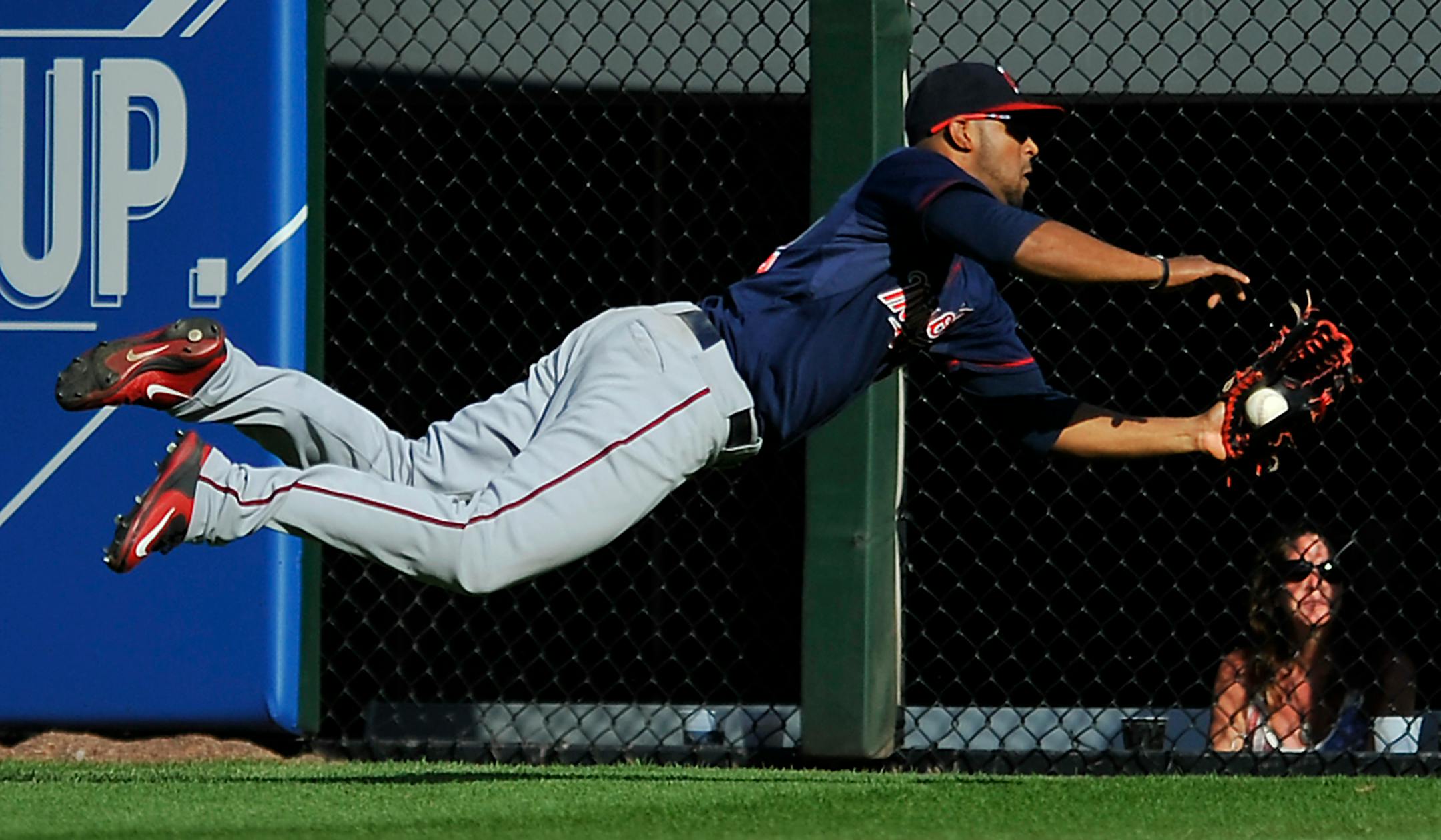 Minnesota Twins center fielder Aaron Hicks (32) catches a fly ball hit by Chicago White Sox's Adam Eaton during the eighth inning of a baseball game Saturday, May 23, 2015, in Chicago. Minnesota won 4-3. (AP Photo/Paul Beaty)