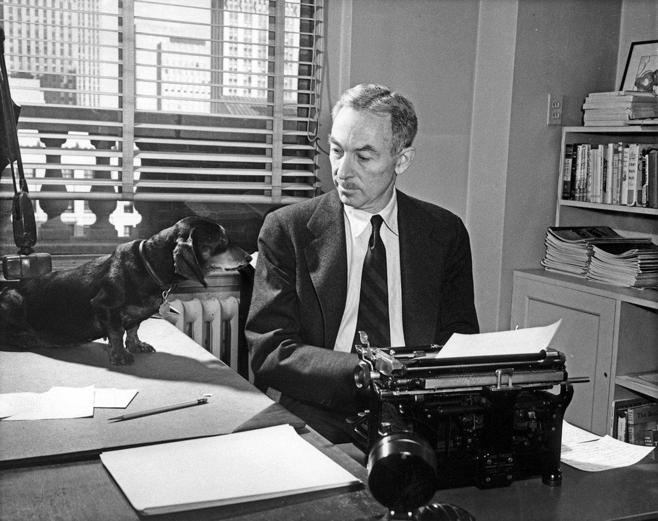 E.B. White and his dog Minnie in White’s office at the New Yorker.