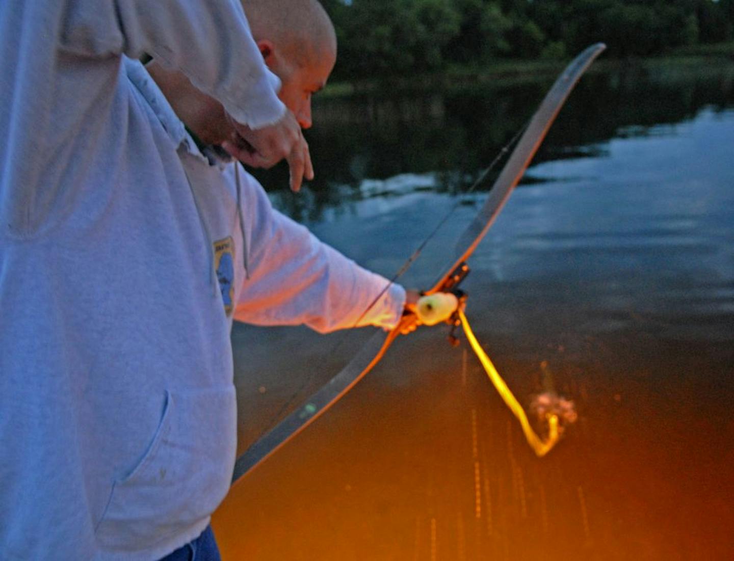 A mishmash of rules in cities around the lake create confusion for people who want to bowfish.