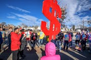 Pressure has been growing for raising pay at the low end of the wage scale. This rally for a higher minimum wage was held at the Minnesota State Capit