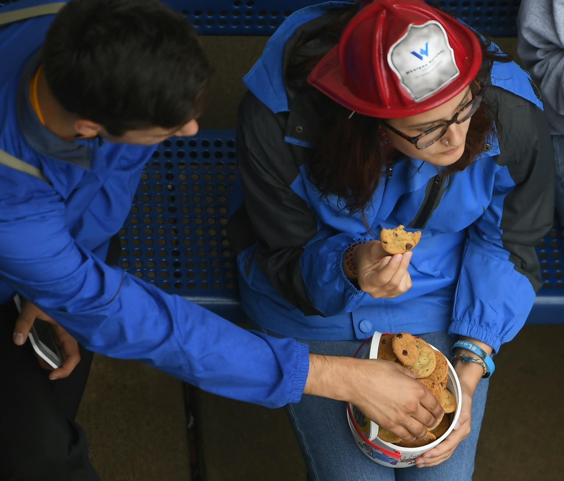 Andrew Gasperlin and Zoe Knutson-Kolodzne, both seniors at St. Cloud Apollo, shared a bucket of Sweet Martha's Cookies.