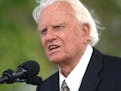FILE - In this June 26, 2005 file photo, the Rev. Billy Graham speaks on stage on the third and last day of his farewell American revival in the Queen