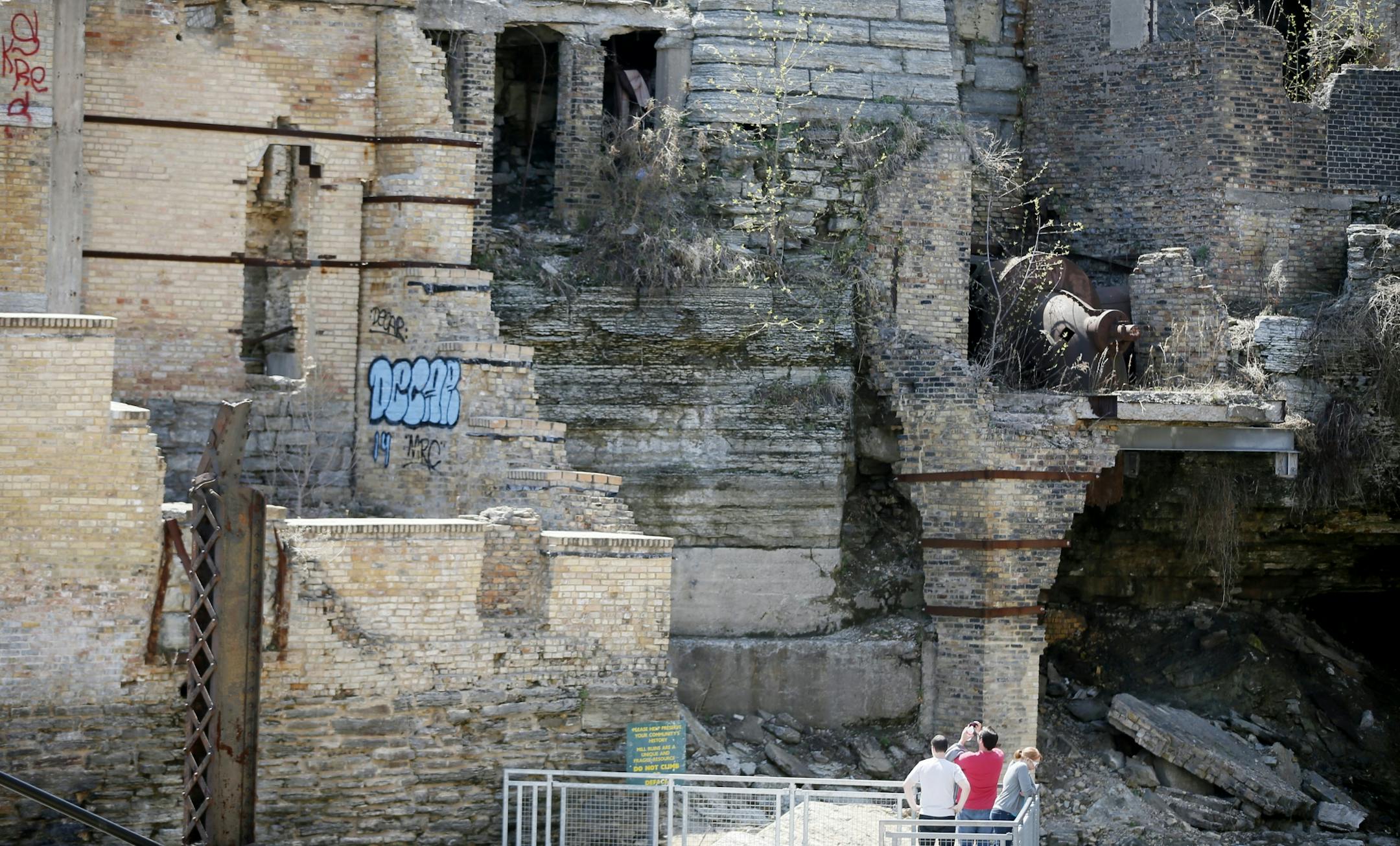 Someone tagged the Mill Ruins with graffiti located at Mill Ruins Park near the Stone Arch Bridge Monday May 5, 2014 in Minneapolis, MN.
