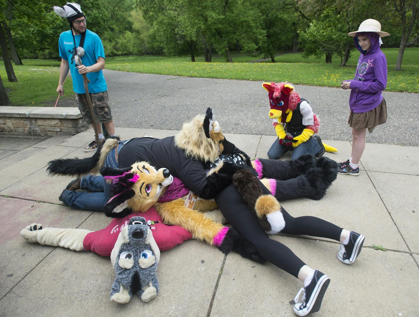 MN Furs members jumped onto one another after one of them called out "fur pile!"