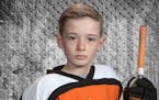 Marshall "Turbo" Bader, 9, of Boy River, Minn., died in a farm accident. He was an avid hockey player and he's being honored with hockey sticks displa