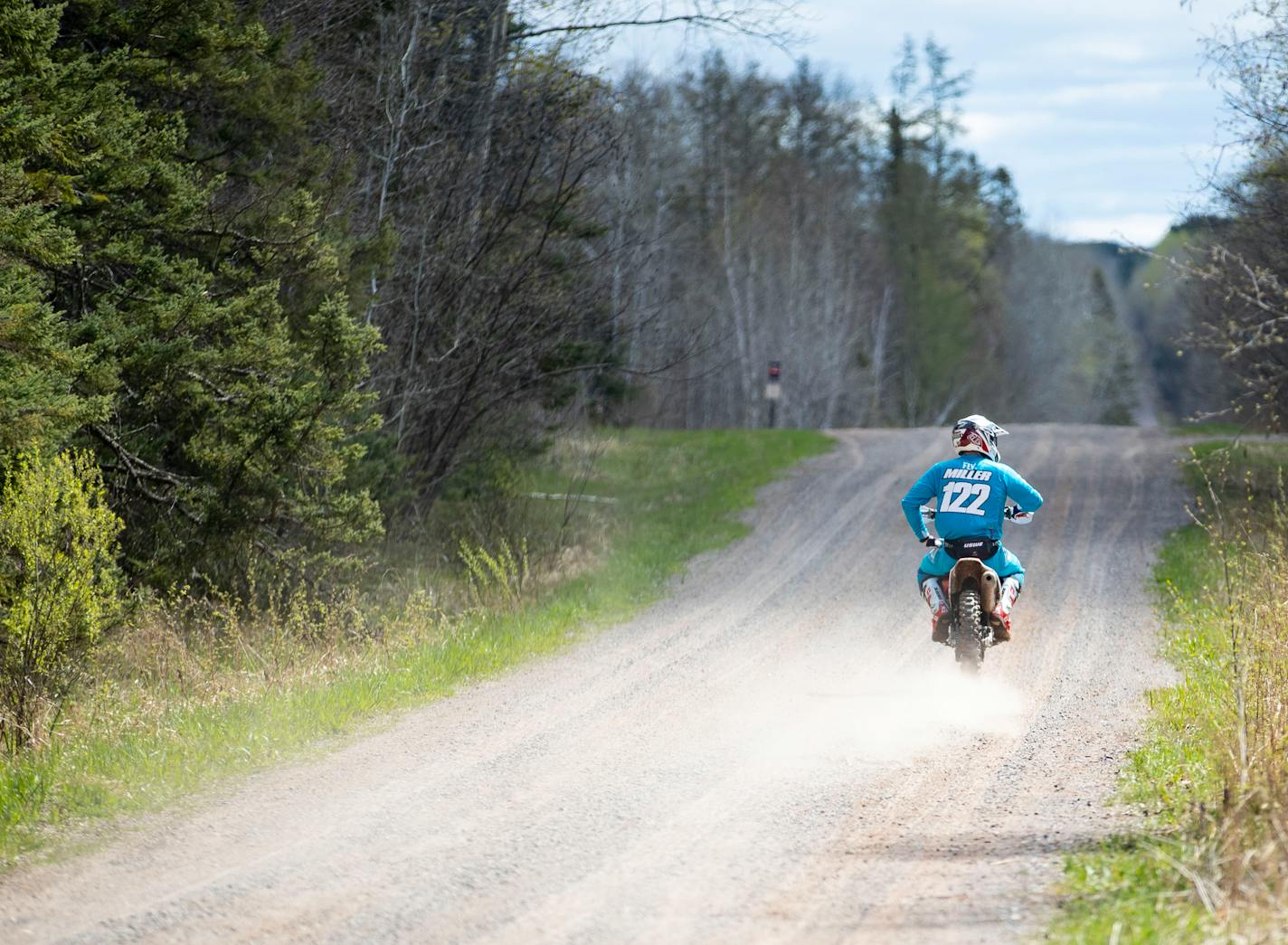 Baylor Litsey rode his dirt bike on a County Road near the Nemadji Forest on Friday Sunday, May 7, 2021. ]