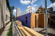 Construction on a small apartment building in Uptown in Minneapolis in June 2022. The building at 3333 Hennepin Avenue was designed in response to Min