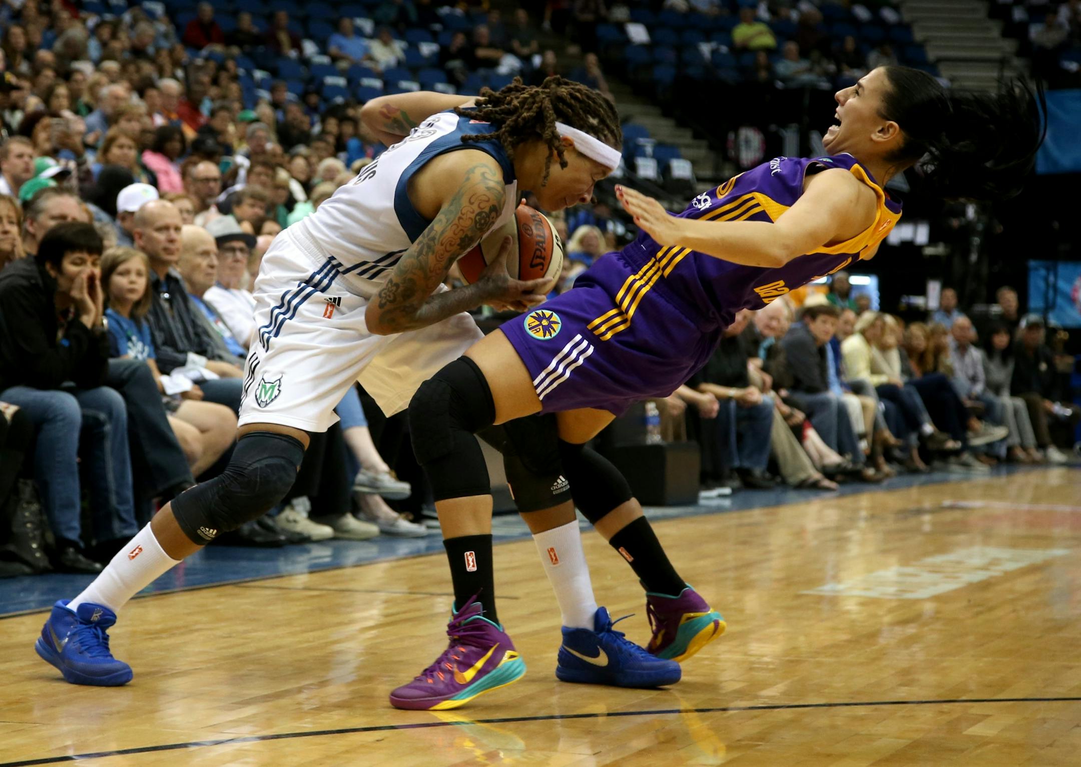 Seimone Augustus was called for the offensive foul against Sparks Ana Dabovic in the second half of Game 1 at Target Center.