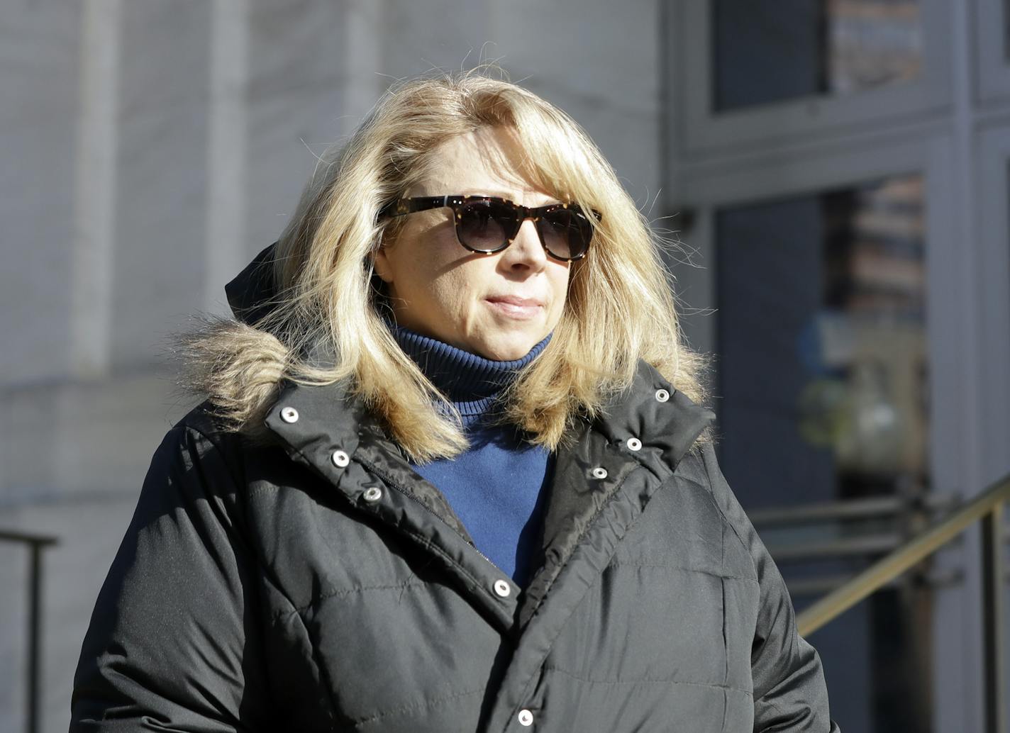 Diane Backis, pictured leaving the federal courthouse in Albany in 2016, was sentenced to five years in jail. (AP Photo/Mike Groll)