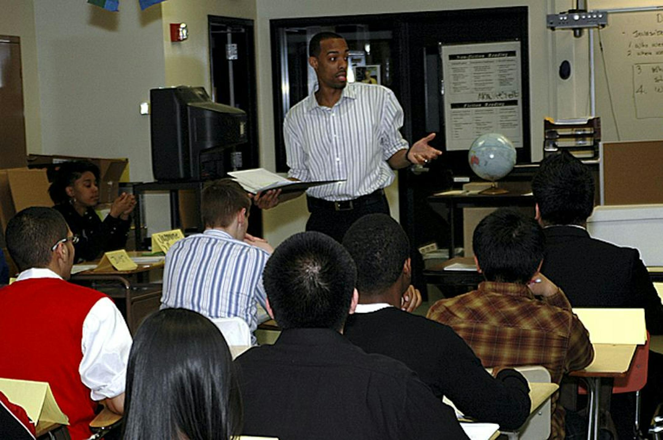 SubmittedGeorge Ellis, program associate for STEP-UP Achieve Summer Jobs, speaks to kids at a readiness session.