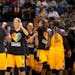 The Los Angeles Sparks celebrated after defeating the Minnesota Lynx Friday night 94-76.