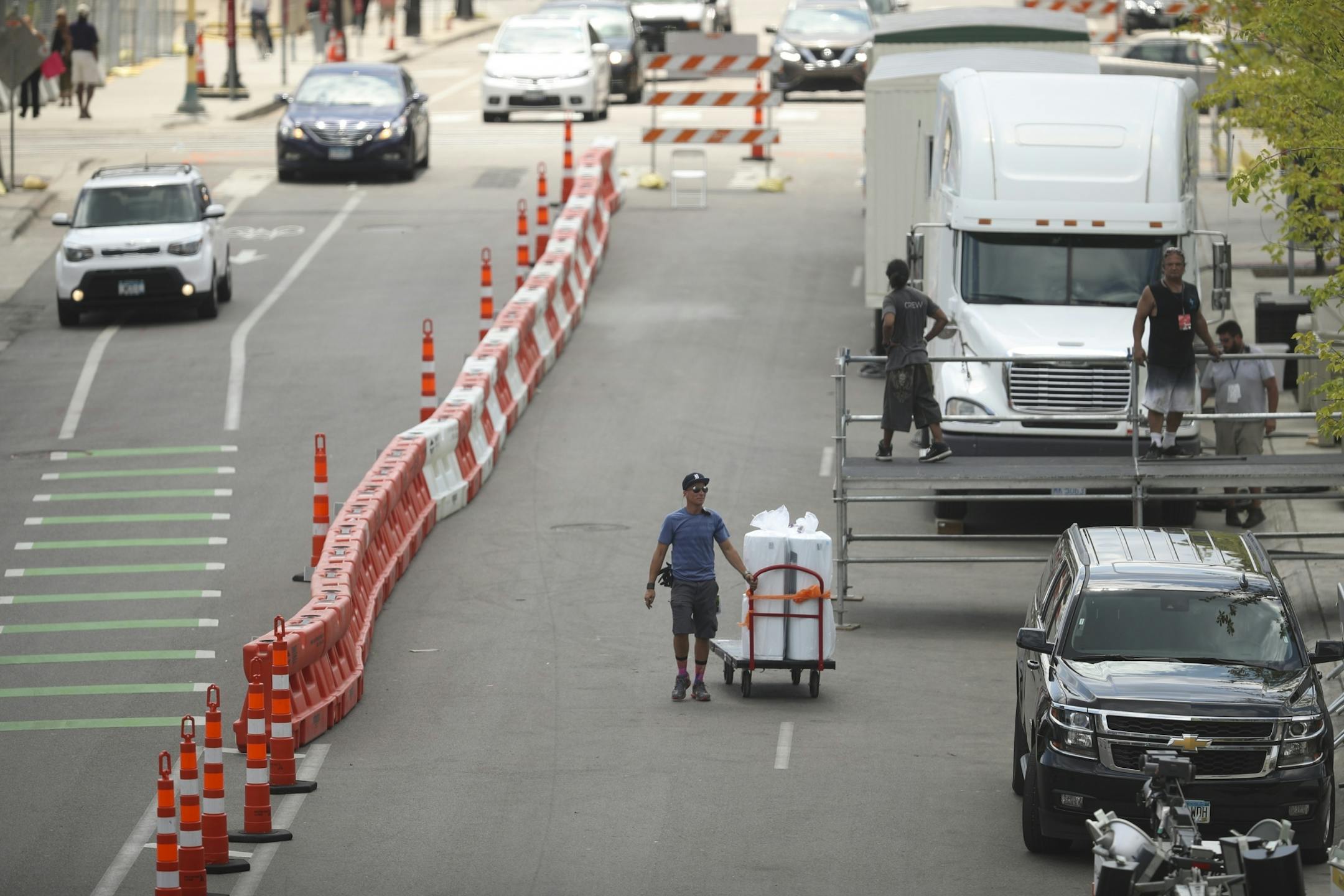 Park Ave. S. is closed down to one lane as workers set up a stage in The Commons Park in advance of the X Games this weekend.