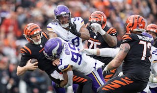Minnesota Vikings linebacker Danielle Hunter (99) sacked Cincinnati Bengals quarterback Jake Browning (6) in the second quarter Saturday December ,16 