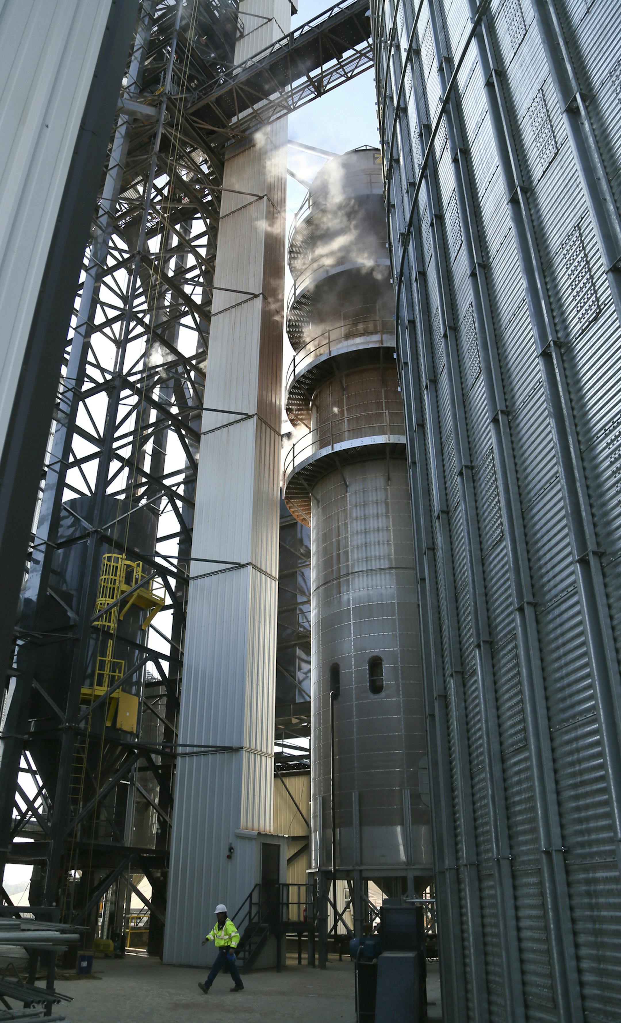 Steam escapes from a propone fire continuous blow dryer Friday, Nov. 1, 2013, as corn is dried at Interstate Mills in Randolph, MN. The corn drier] can dry 5,000 bushels of corn in one hour.](DAVID JOLES/STARTRIBUNE) djoles@startribune.com With late and wet corn harvest, propane shortage hits farm country. Southwest and western Minnesota feel it the worst. Some grain elevavators have shut down corn drying due to propane shortage. The problem: a concentrated corn harvest this year due to a late p