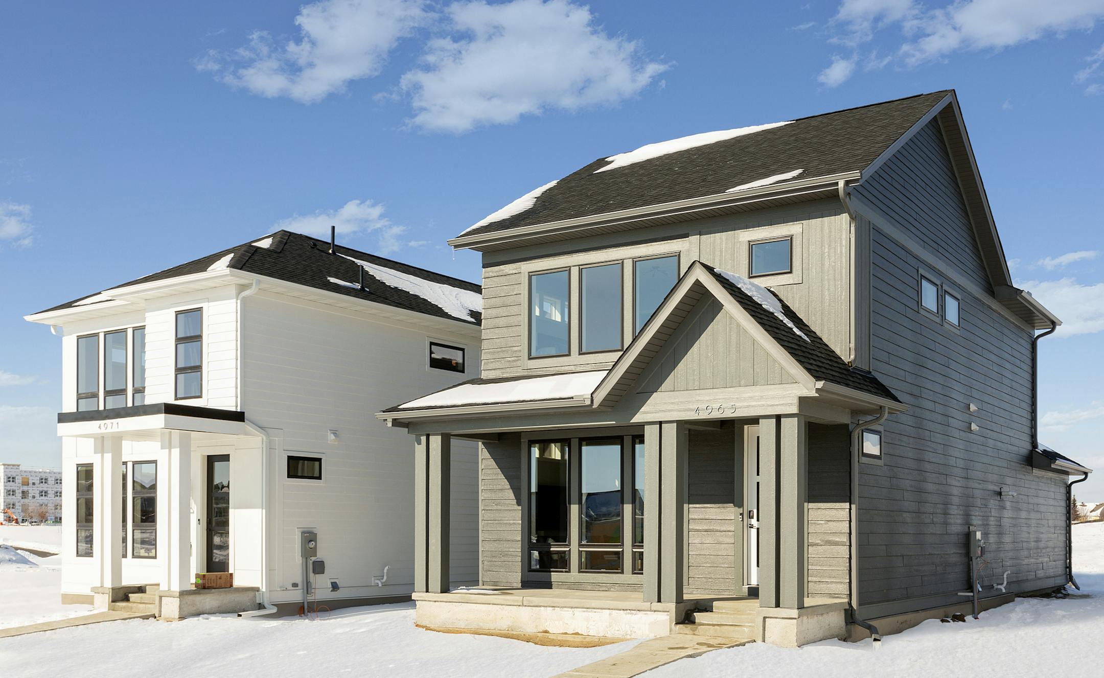 Sidewalks, front porches and back alleys are among the urban-inspired amenities at RT Urban's new Revival Collection in Lakeville.