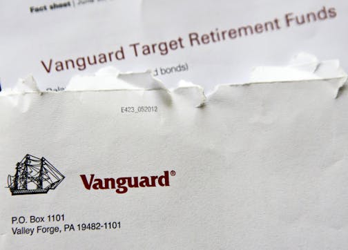 In this June 7, 2018, photo the logo for the Vanguard Group is shown on correspondence in Zelienople, Pa. Vanguard said Monday, July 2, that it will stop charging commissions to trade most of its competitors&#x2019; exchange-traded funds. (AP Photo/Keith Srakocic)