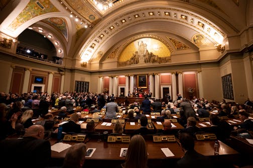 A divided house responds to Minnesota Gov. Tim Walz's remarks during the State of the State address Wednesday night  in the house chambers of the Minnesota State Capitol in St. Paul, Minn.