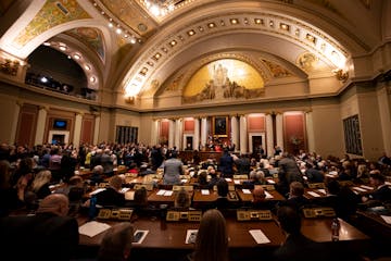 A divided house responds to Minnesota Gov. Tim Walz's remarks during the State of the State address Wednesday night  in the house chambers of the Minn