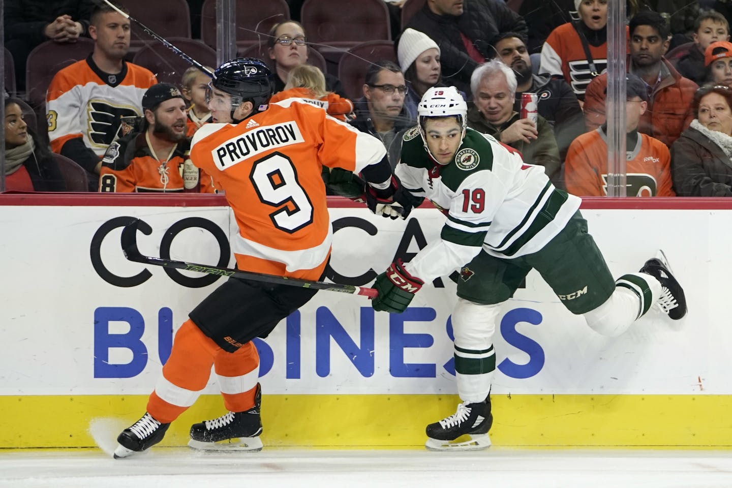 Philadelphia Flyers' Ivan Provorov, left, collides with Minnesota Wild's Luke Kunin during a game in November. Kunin was recalled from the AHL on Tuesday.