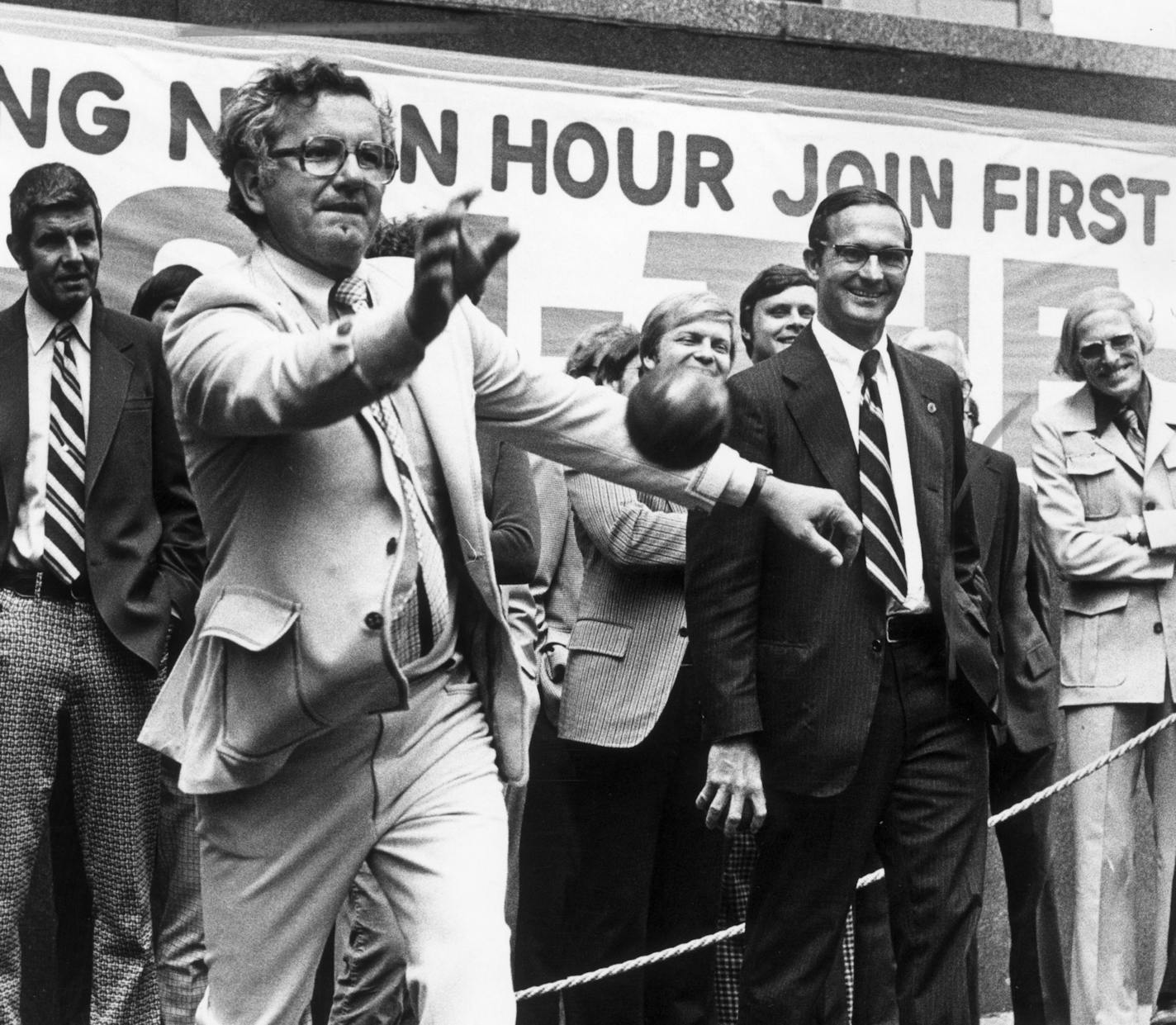 Minnesota governor Rudy Perpich demonstrated his skill as a bocce player August 17, 1977, in the plaza of the First National Bank of Minneapolis. The bocce court at the plaza will be open for public use. The bank will donate the bocce balls and court to the Minneapolis Park Board for use in a city park. Star Tribune photo by William Seaman, August 17, 1977.